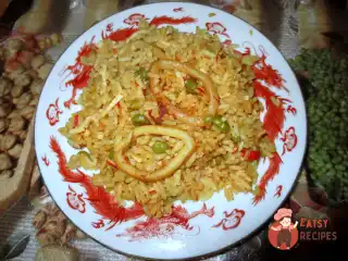 Паелья з кальмарами у пиві