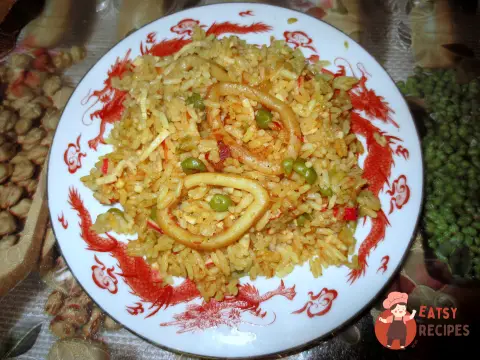 Паелья з кальмарами у пиві