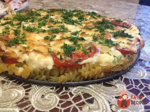 Макарони, запечені з помідорами під сиром