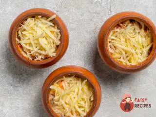 Крок 12: Картопля зі свининою в горщиках