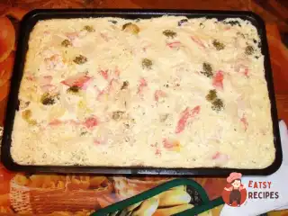 Куряча грудка з броколі під сирним соусом