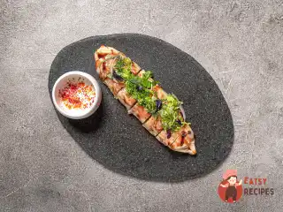 Скумбрія в лаваші з овочами та спеціями