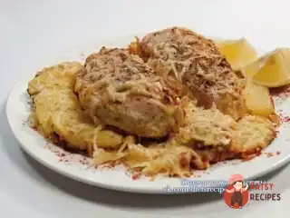 Курячі грудки, запечені у вершках під сиром