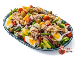 Салат з печінкою тріски, картоплею та квасолею