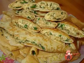 Млинці з сиром та зеленню