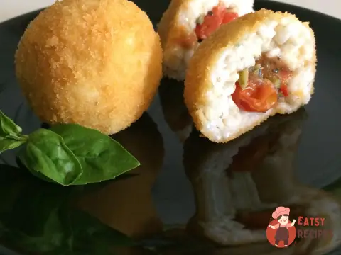 Аранчіні (Alla puttanesca)