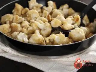 Печена цвітна капуста з морською сіллю та чорним перцем