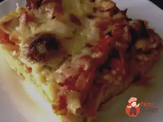 Спагетті з помідорами та сиром у духовці.