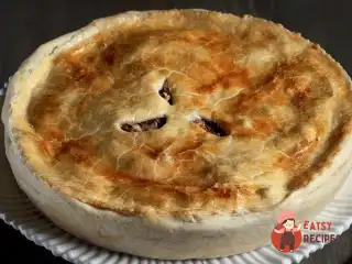 Пиріг із цесарки з лісовими грибами та тархуном