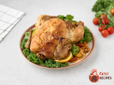 Курка, фарширована овочами, у духовці