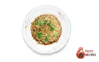 Перловка, Томлена З Гранатовим Соусом Та Савойською Капустою.