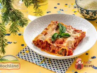 Каннеллоні з сирним сиром, в'яленими томатами та оливками