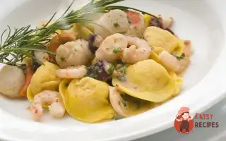 Равіолі З Морепродуктами У Вершково-Сирному Соусі.