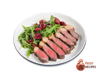 Тальята з піканням, рукколою та маринованою черешнею