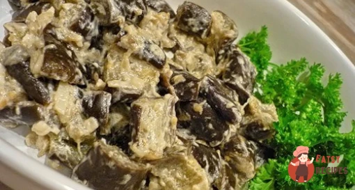 Баклажани з цибулею в сметані