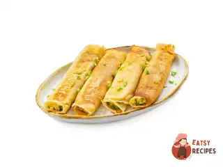 Млинці із зеленою цибулею та яйцем