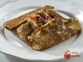 Млинці з м'ясною начинкою