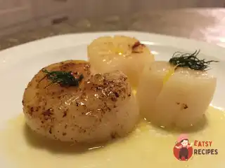 Смажений морський гребінець в апельсиновому соусі