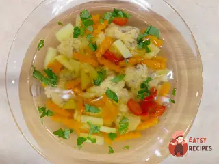 Крок 12: Курячий бульйон з галушками із сердець