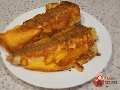 Смажений хек у клярі