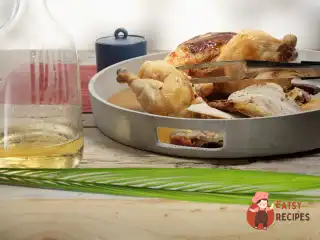 Курка, запечена з ароматним маслом та мандаринами