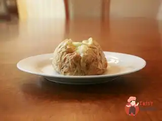 Печену картоплю з часником