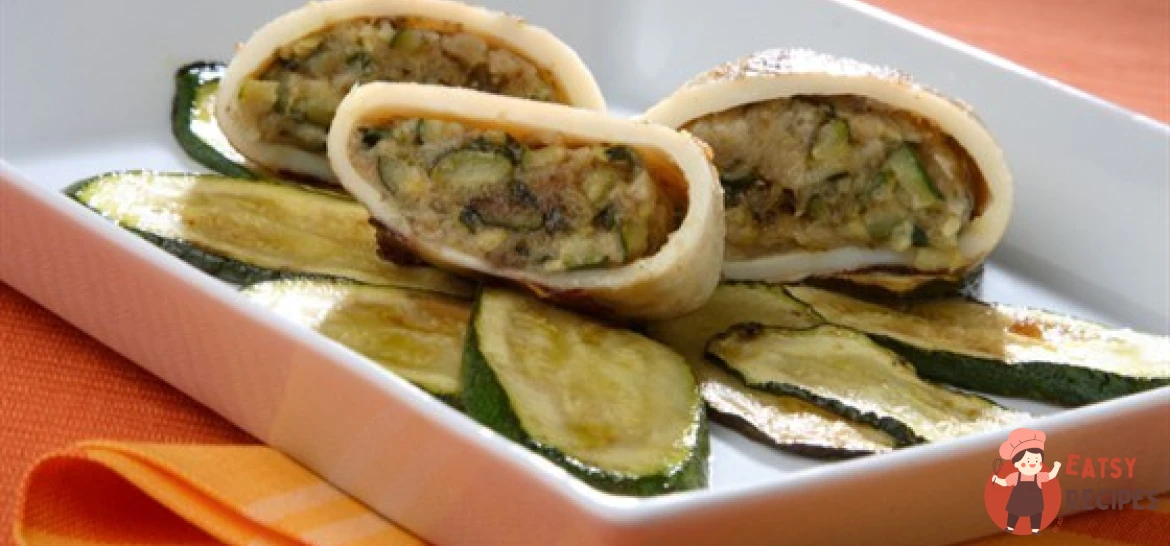 Кальмари, фаршировані цукіні, грибами та картоплею