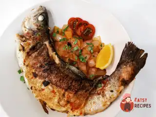 Порційна форель на сковороді