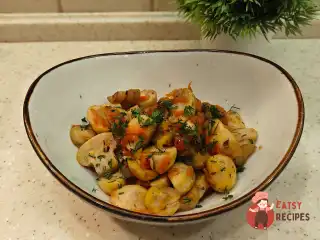 Закусочні шампіньйони на сковороді