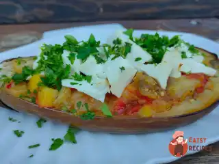 Баклажани, запечені з овочами та бринзою