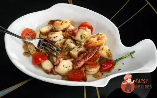 Смажені Морепродукти З Часником Та Томатами