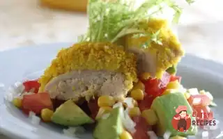 Курка Запечена В Паніровці З Кускусу З Прянощами Та Овочами.