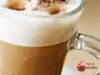 Кавовий грог з вершками, прянощами та цедрою апельсина.