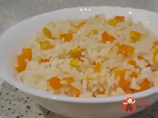 Варений рис з кукурудзою, морквою, гарбузом і вершковим маслом.