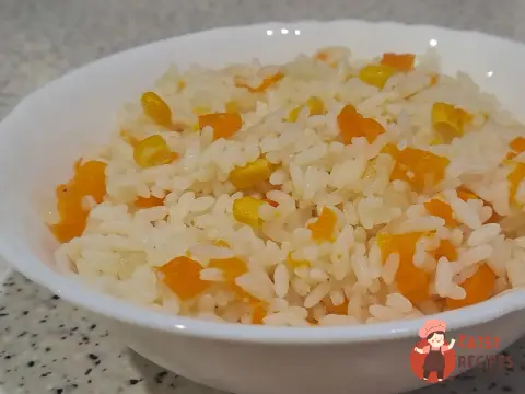 Варений рис з кукурудзою, морквою, гарбузом і вершковим маслом.