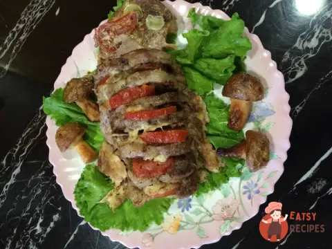 Свинина, запечена гармошкою, з картопляними грибочками