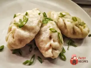 Пігоді - паровий пиріжок з начинкою з фаршу та капусти