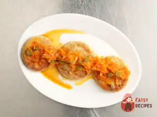 Медальйони зі щуки з маринадом з корнішонів