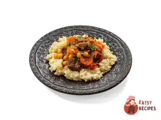 Баранина з нутом і кускусом