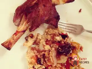 Баранина нога із запеченими овочами та кускусом