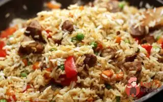 Рис Зі Свининою Та Овочами