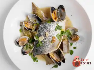 Філе сибаса з артишоками та вонголі