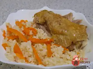 Рис з курячих стегон у духовці