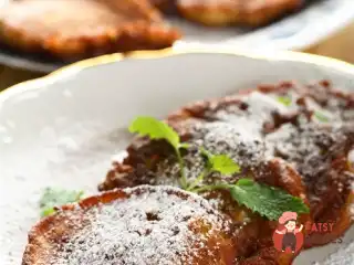 Гарбузові млинці з цукровою пудрою