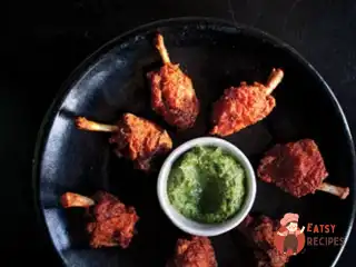 Золотисті курячі крильця у фритюрі