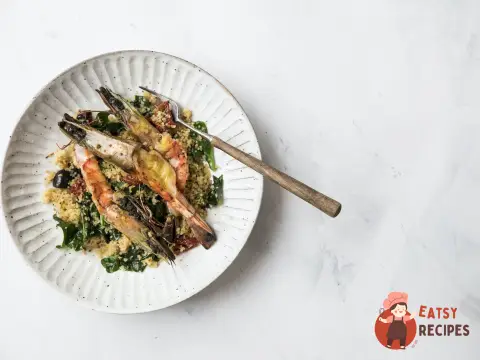 Салат з креветками, кускусом та олією з куркумою
