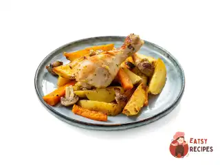 Курячі гомілки з картоплею в духовці