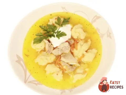 Курячий бульйон з манними галушками