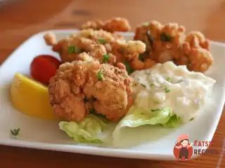 Хрусткі курячі шматочки в золотистій скоринці
