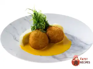 Котлети по-київськи з перепілки з гарбузовим соусом та картопляним пюре